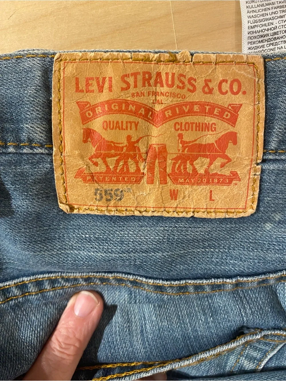 559 Levi's Straight Leg Light Blue Jeans 44 x 30 (SH)